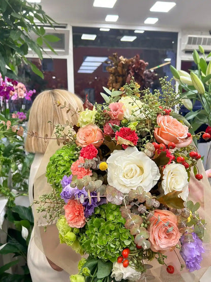 Composizione floreale mista per bouquet di laurea